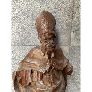 Small Statue Of Saint On A Pedestal 