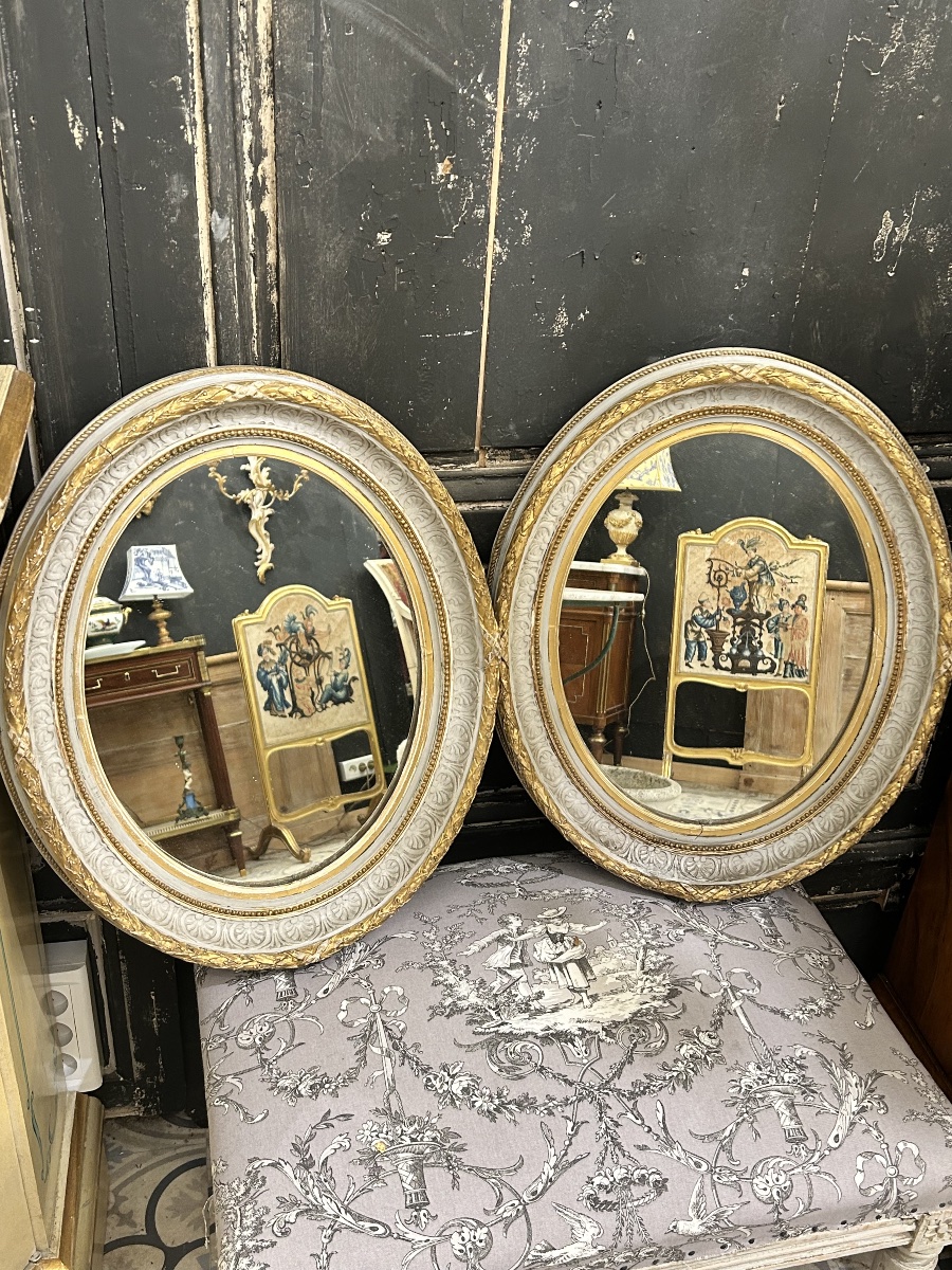 Pair Of Oval Openwork Mirrors Made Of Polychrome Stuccoed Wood 