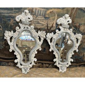 Paire de miroirs en bois sculpté  rechampis style Louis XV 