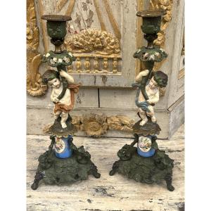 Pair Of Candlesticks Decorated With Putti
