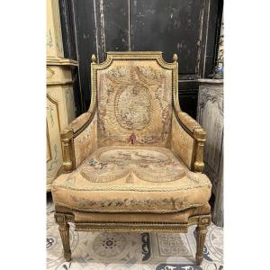 Bergère en bois doré style Louis XVI