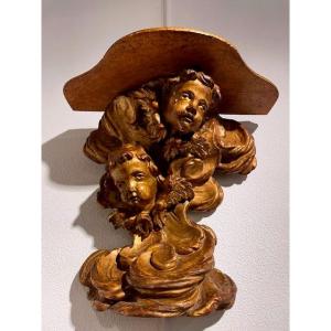 console murale en bois sculpté et doré fin du 17 eme