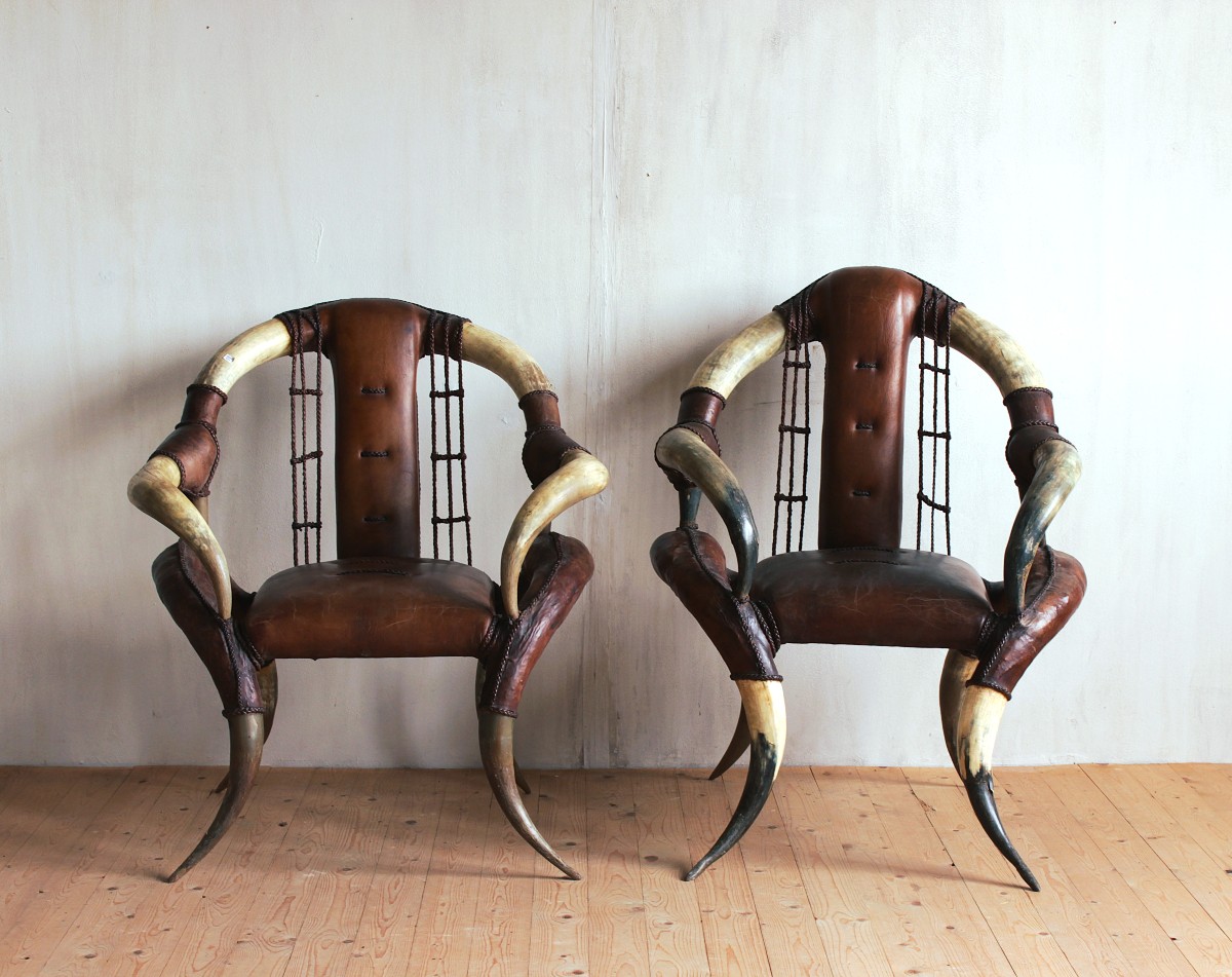 Pair de fauteuils Buffalo style Michel Hailard