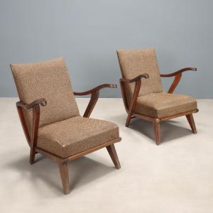 Paire de fauteuils vintage avec pieds et accoudoirs en bois apparents, rembourrage en mousse et