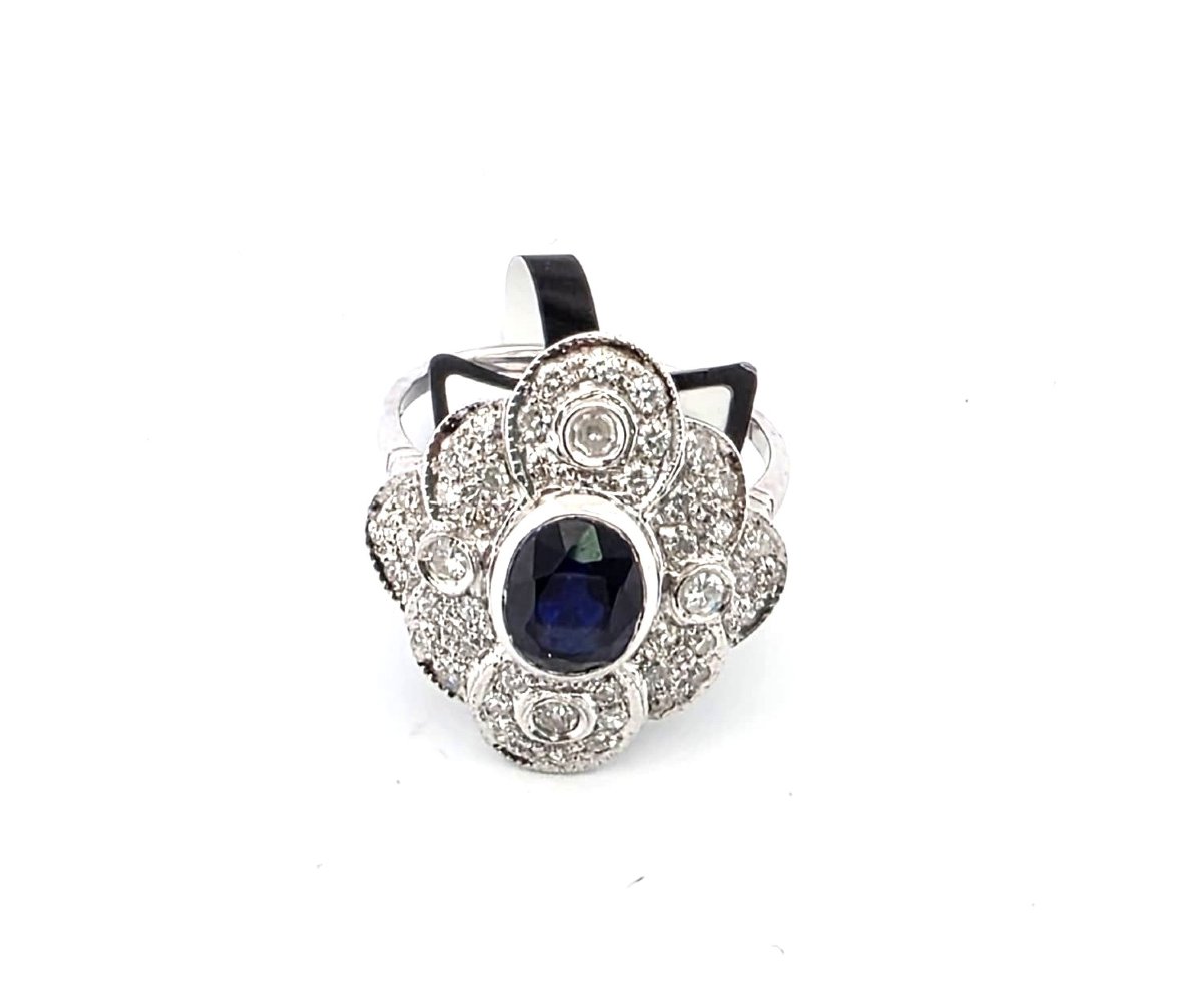 18-karat White Gold Ring With Sapphire And Diamonds-photo-3
