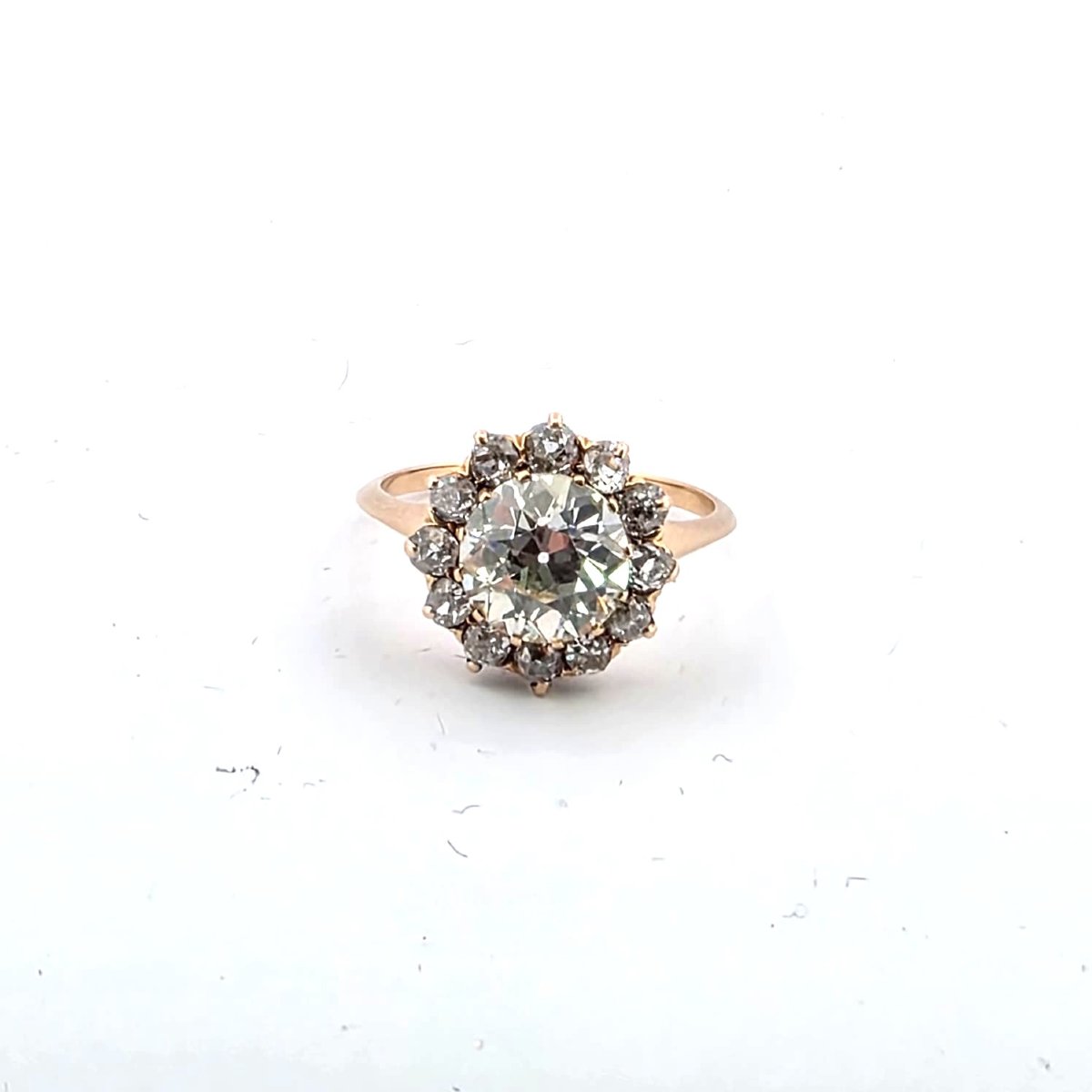18kt Rose Gold Ring With A Center Diamond And Diamonds Set Around It-photo-3