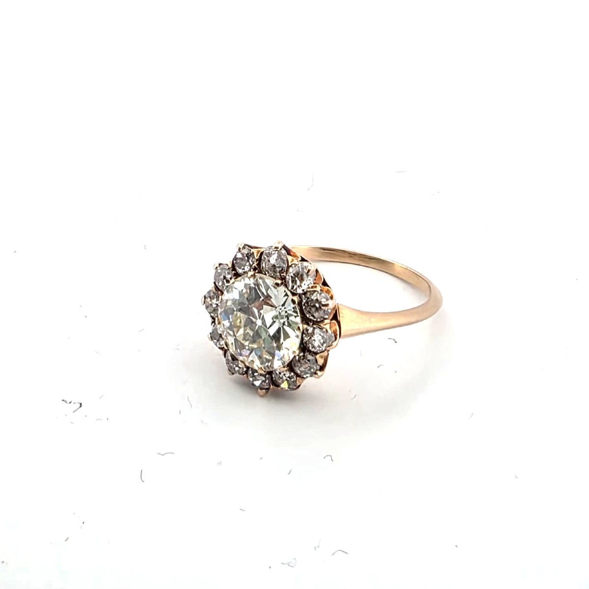 18kt Rose Gold Ring With A Center Diamond And Diamonds Set Around It-photo-4