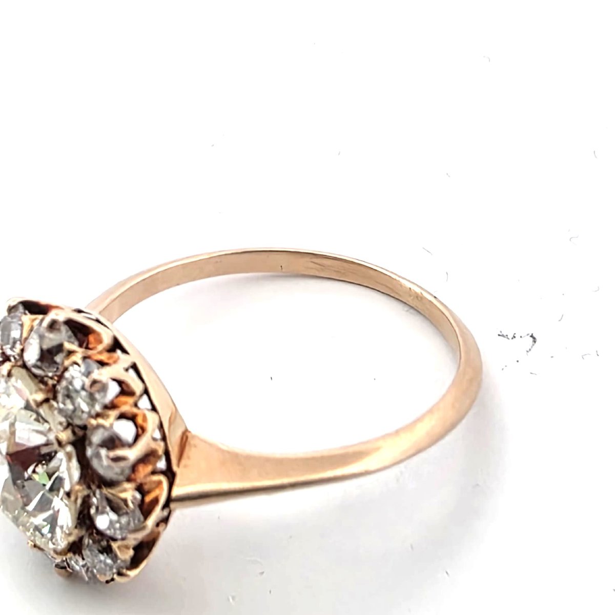18kt Rose Gold Ring With A Center Diamond And Diamonds Set Around It-photo-4