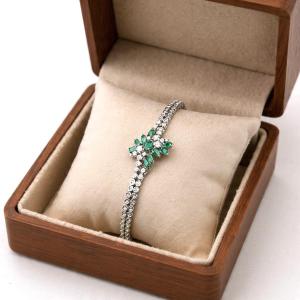 Bracelet vintage en or blanc 18kt avec émeraudes et diamants