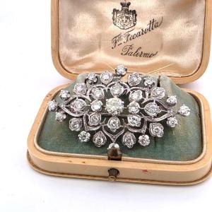 Broche en or blanc 18 kt avec diamants