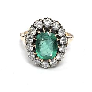 Bague en or jaune 18kt avec diamants et émeraude