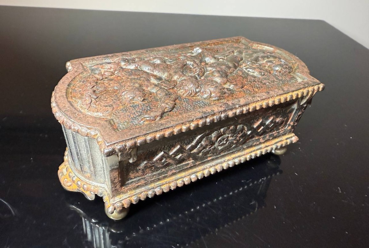 Antique Box Or Small Jewelry Box With Embossed Decoration Of Cherubs.