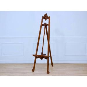 Chevalet En Bois Sculpté Et Mouluré à Décor d'Enroulements. -
