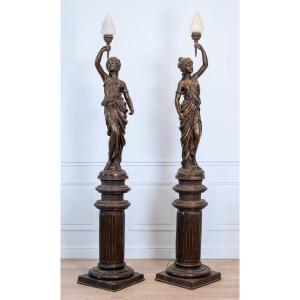 An Important Pair Of Monumental Figurative Bronze Torchères.