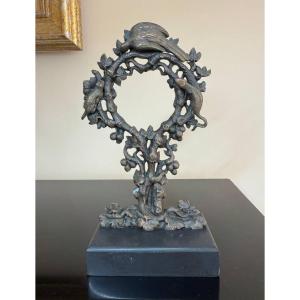 Bronze Watch Holder Decorated With Vine Motifs And Animals