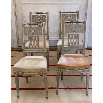 SUITE DE QUATRE CHAISES D'ALCÔVE, EPOQUE DIRECTOIRE