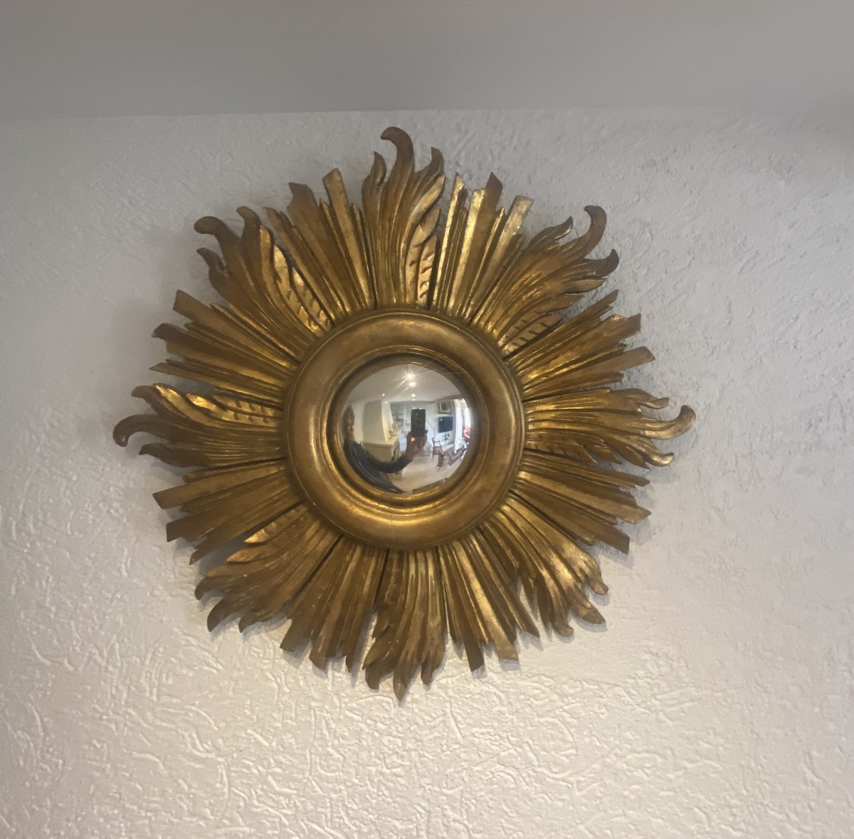 Miroir soleil en bois doré 