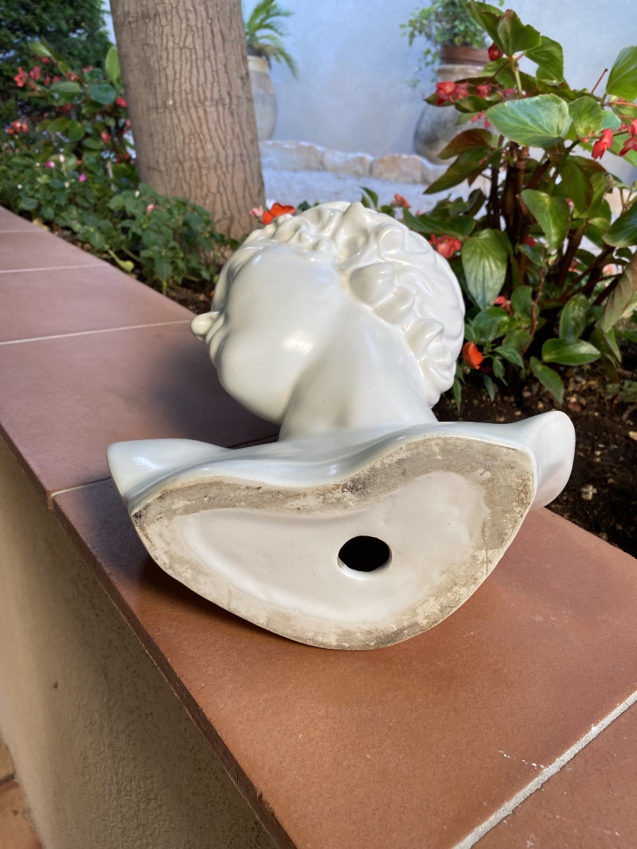 Bust Of A Young Boy In White Ceramic -photo-1