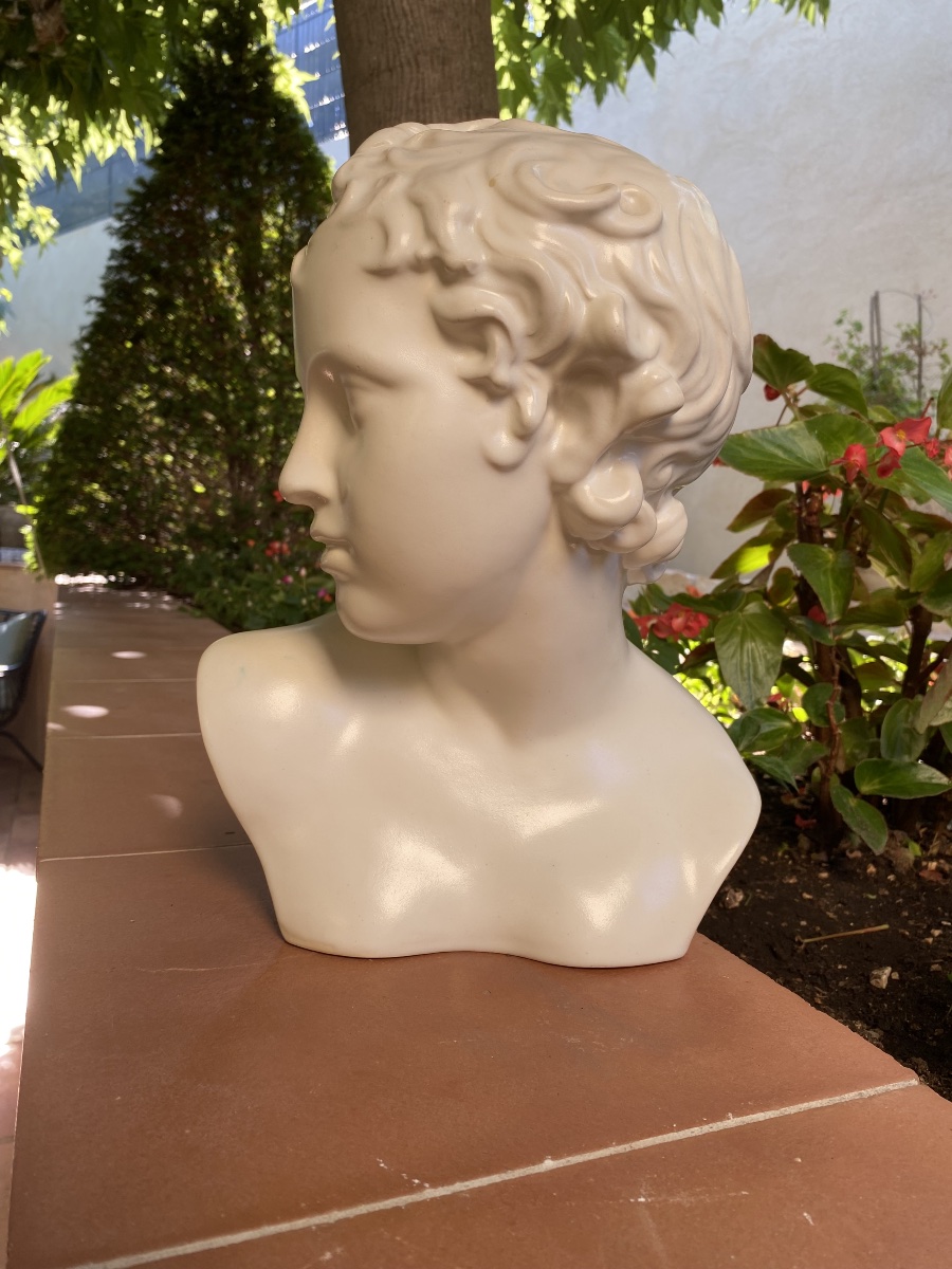 Bust Of A Young Boy In White Ceramic 