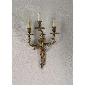 Une applique style rocaille en bronze doré 