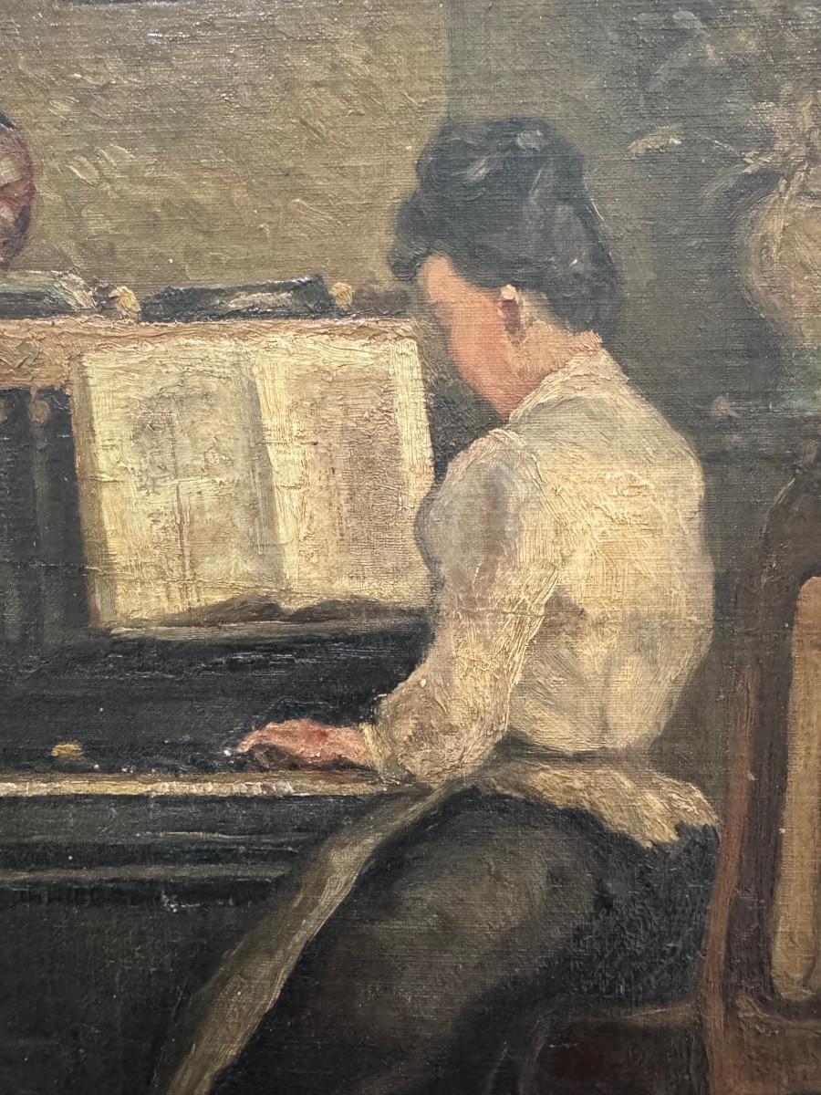 Young Woman Playing The Piano Circa 1900-photo-2