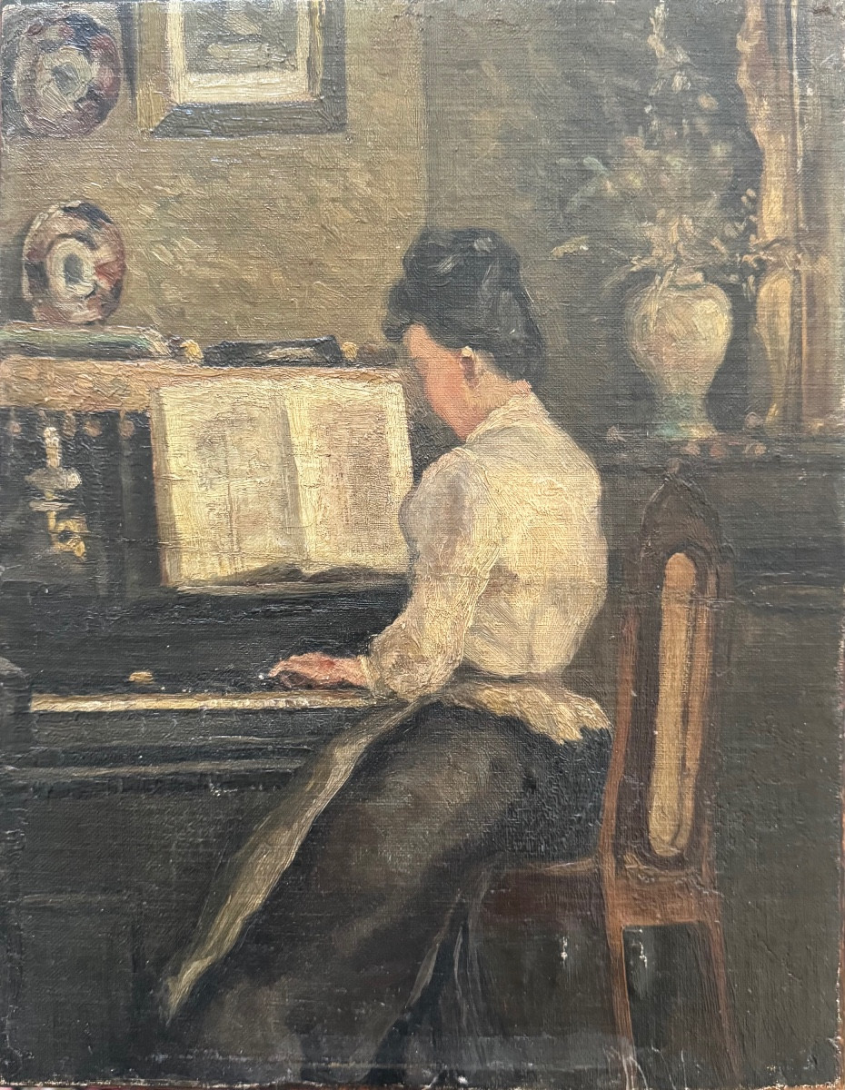 Young Woman Playing The Piano Circa 1900