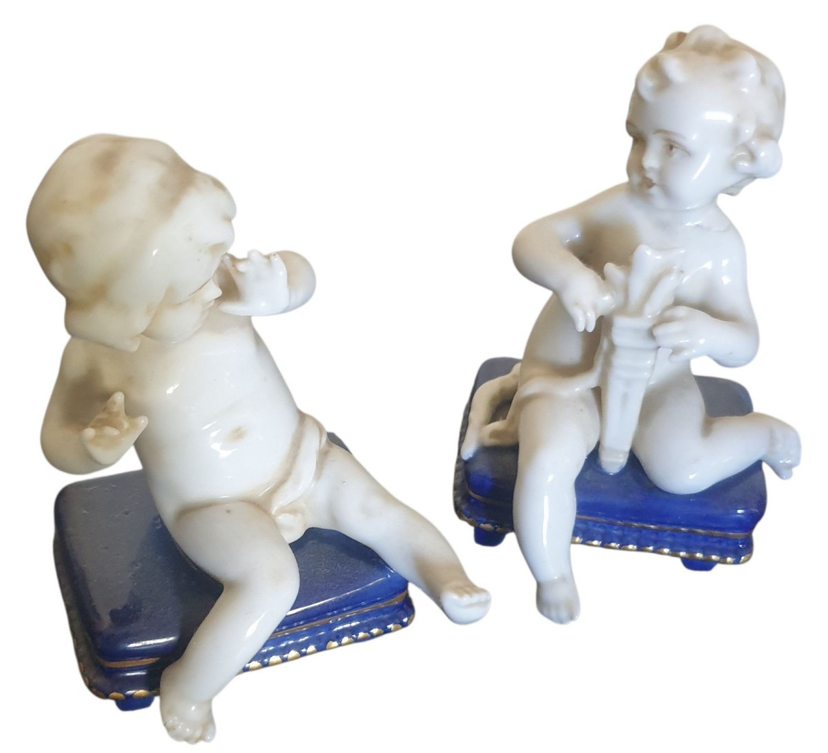 Paire de cupidons en porcelaine de la manufacture de Müller
