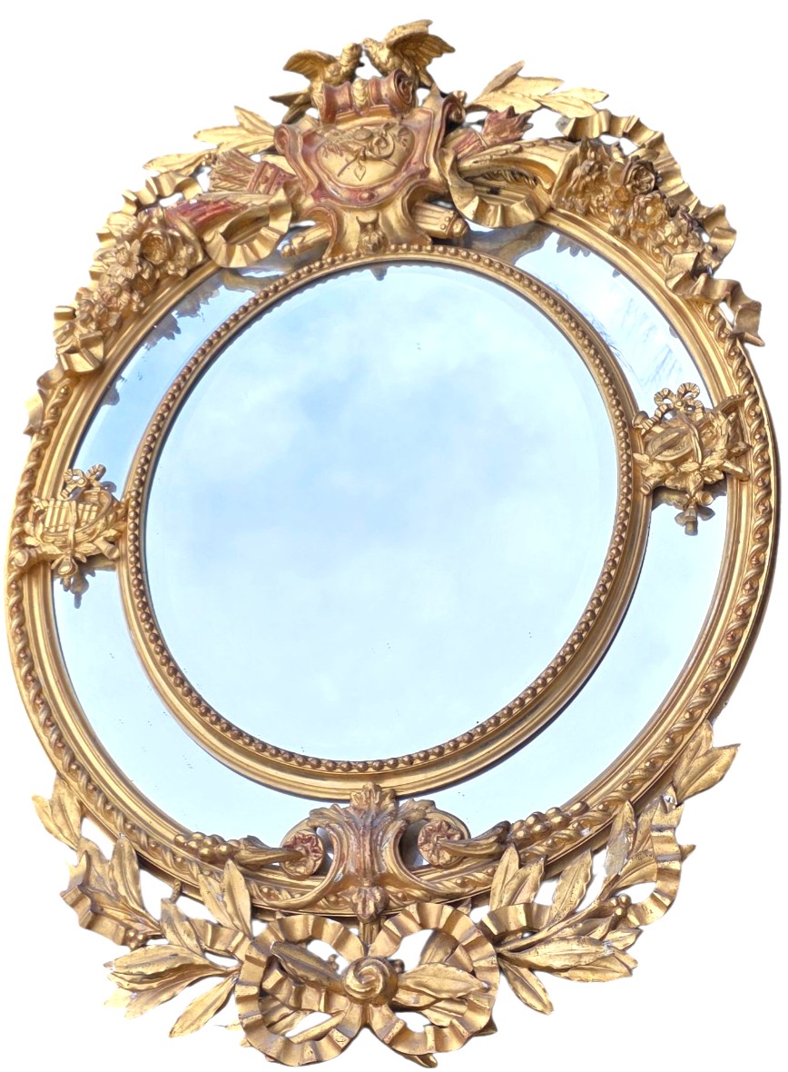 Immense miroir a parcloses bois doré aux attributs de musiques Napoléon III hauteur 1,60
