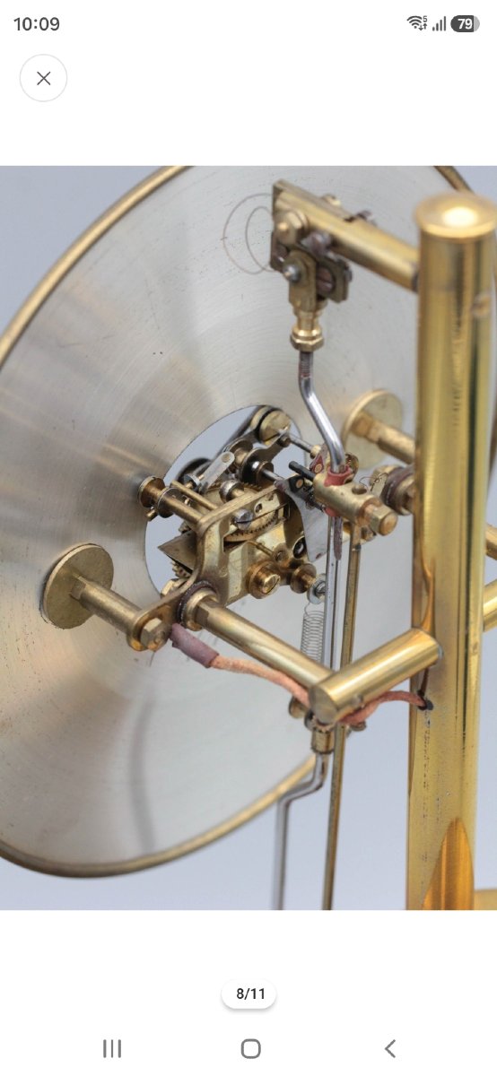 Bulle Clock: Magnetic Skeleton Brass Clock With Perpetual Movement -photo-6