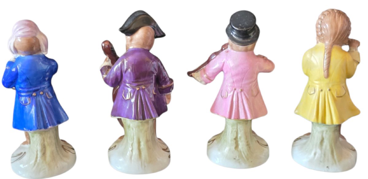 A Superb Collection Of 12 Polychrome Porcelain Figurines Depicting The Famous S Orchestra-photo-4