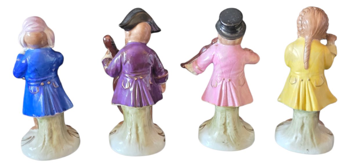 A Superb Collection Of 12 Polychrome Porcelain Figurines Depicting The Famous S Orchestra-photo-2