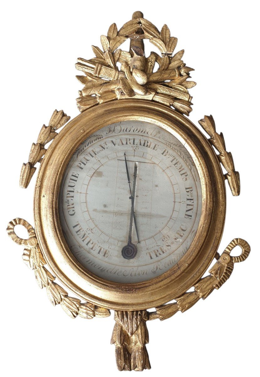  A Louis XVI-era Barometer-thermometer Made Of Carved And Gilded Wood By Gohin In Paris 