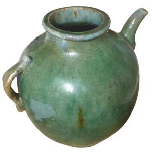 Enciene et Importante cruche en terre cuite vernisée vert 