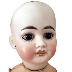 Mechanical Porcelain "jumeau" Doll With An Open Mouth, Wearing Period Clothing