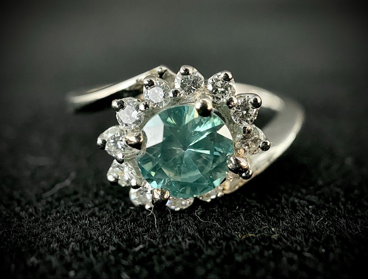 White Gold Ring Set With A 1.03 Carat Green Diamond Surrounded By 0.50 Carat Of Brilliant-photo-3