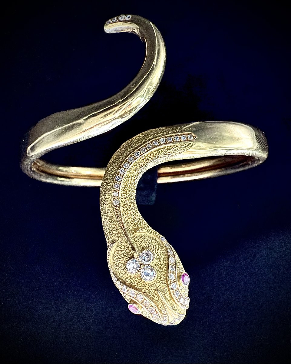 Bracelet esclave en or jaune 18 carats en forme de serpent orné de rubis et brillants-photo-1