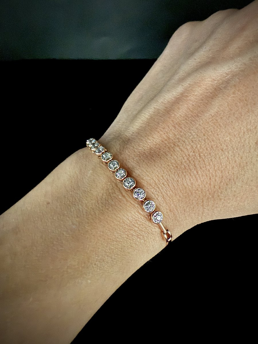 Bracelet semi rigide en or rose 18 carats orné de 11 diamants-photo-3