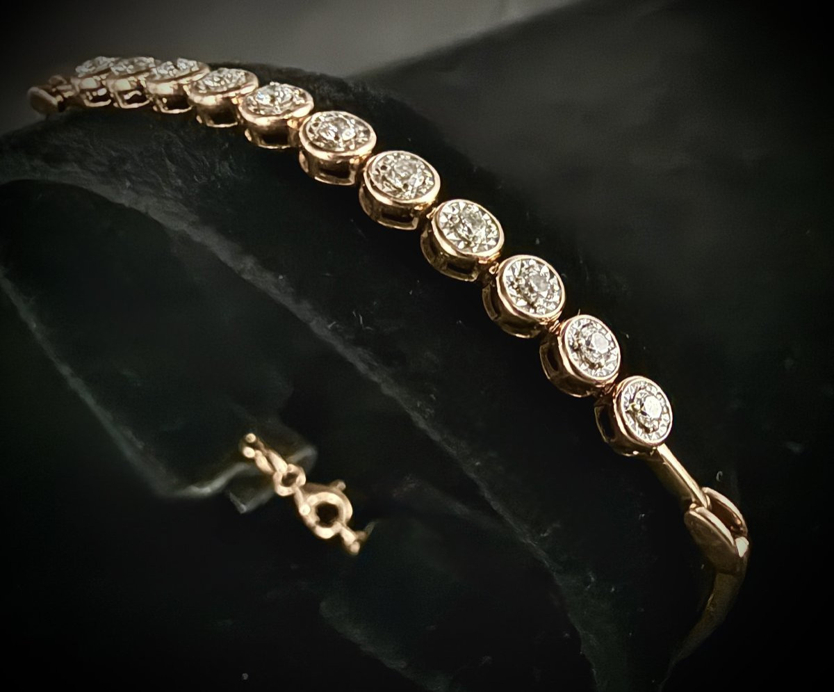 Bracelet semi rigide en or rose 18 carats orné de 11 diamants-photo-1
