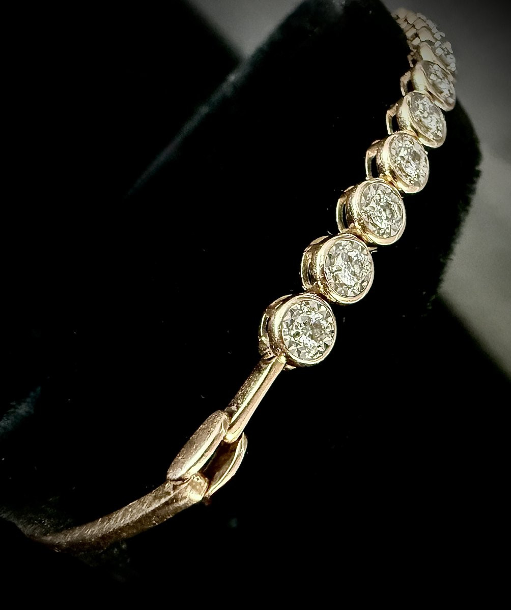 Bracelet semi rigide en or rose 18 carats orné de 11 diamants-photo-3