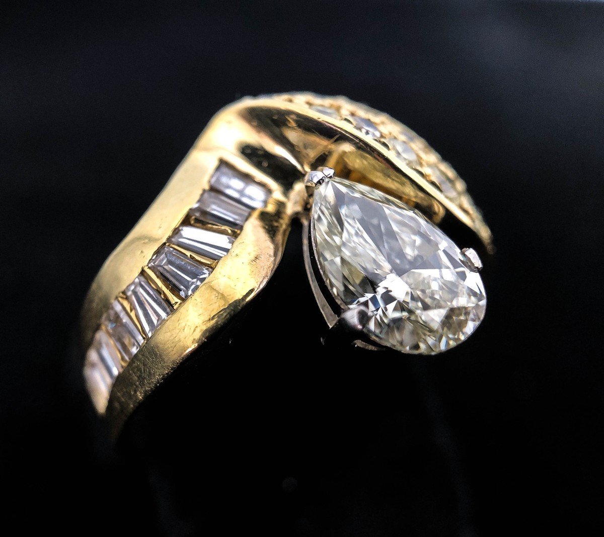 18k Gold Ring With 1 Carat Pear Diamond + 1.50 Carat Diamonds