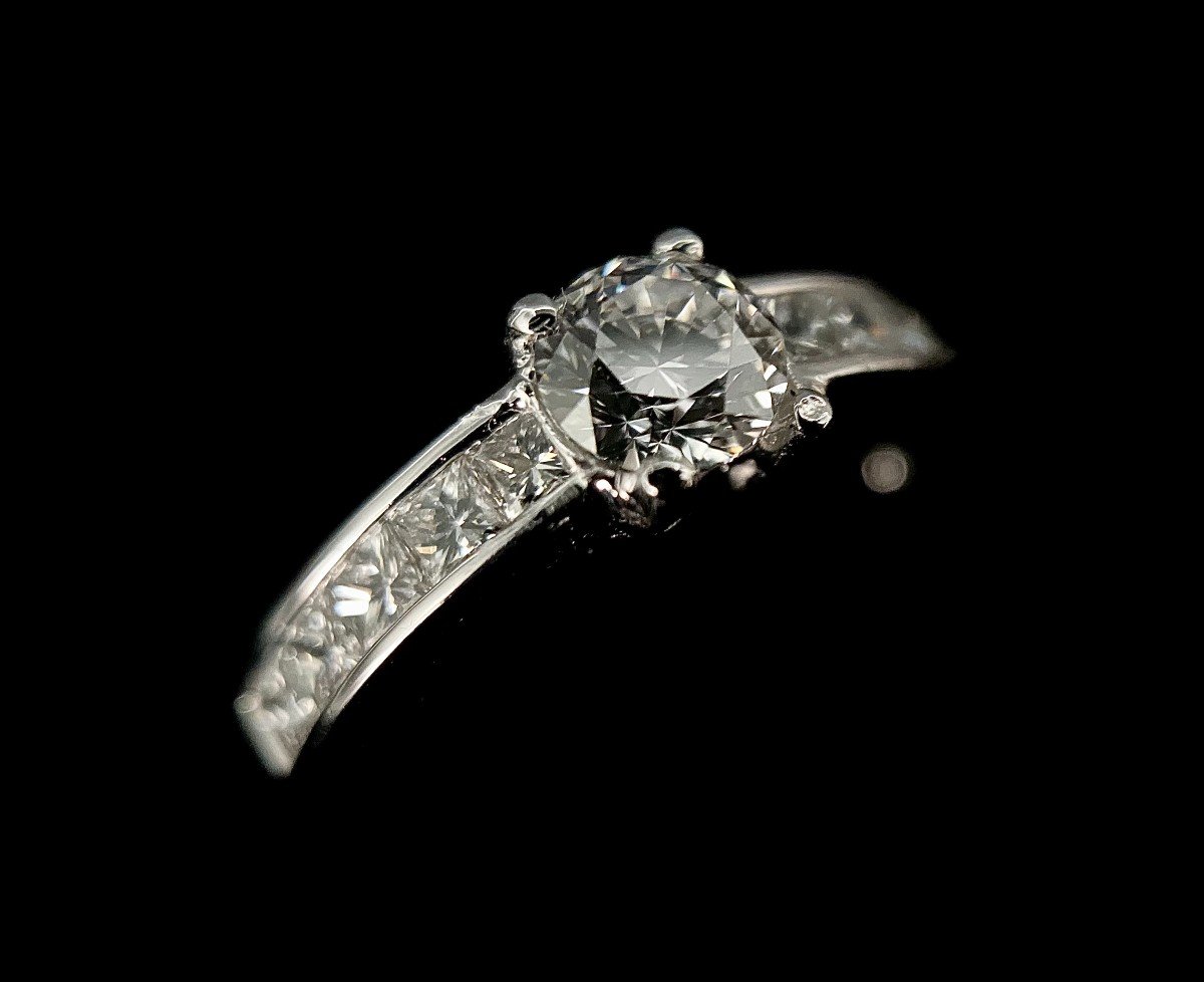 Bague En Platine Sertie d'Un Brillant De 0,50 Carat Et 1 carat de Diamants Taille Princesse