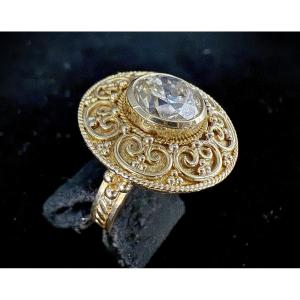 Bague en or jaune à décor filigrané sertie d'un diamant taillé en brillant de 3,50 carats