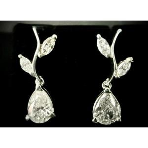 Pair Of White Gold Earrings Set With 3.40 Carats Of Pear-shaped And Marquise-cut Diamonds