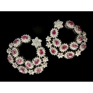 Pair Of White Gold Earrings Set With 4.50 Carats Of Rubies And 7.50 Carats Of Diamonds