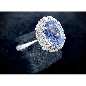 Bague marguerite or 18K avec 1,10ct de saphir et 0,25 ct de diamants. Pierre naturelle testée