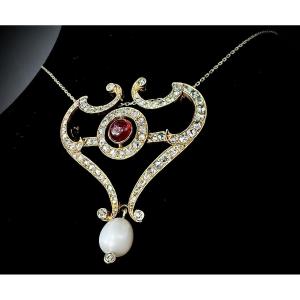 Broche-pendentif trasnformable Art Nouveau, or jaune 18 carats, rubis, perle fine et roses