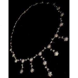 18k White Gold Necklace Adorned With 27 Flowers Totaling 9.84 Carats