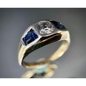 Ring Set With A 0.85 Carat Diamond And Two Trapeze Sapphires