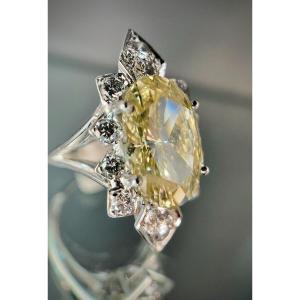 18k White Gold Ring Set With A 5.50 Carat Si-yellow Oval Cut Diamond