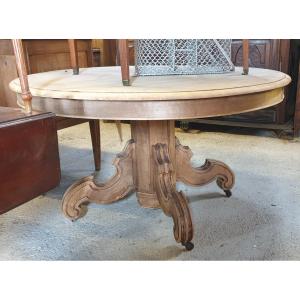 Table ovale à pied central en noyer, époque Louis Philippe 